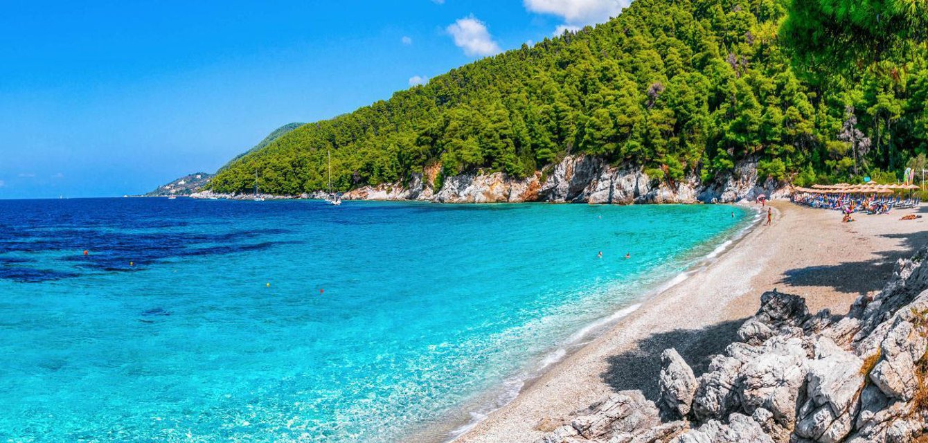 Mamma Mia sailing sightseeing in the crystal clear azure beach of Kastani, Skopelos, Greece